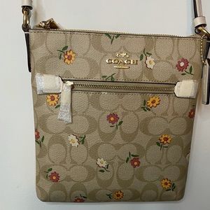BRAND NEW!! NEVER WORN!! Coach bag.